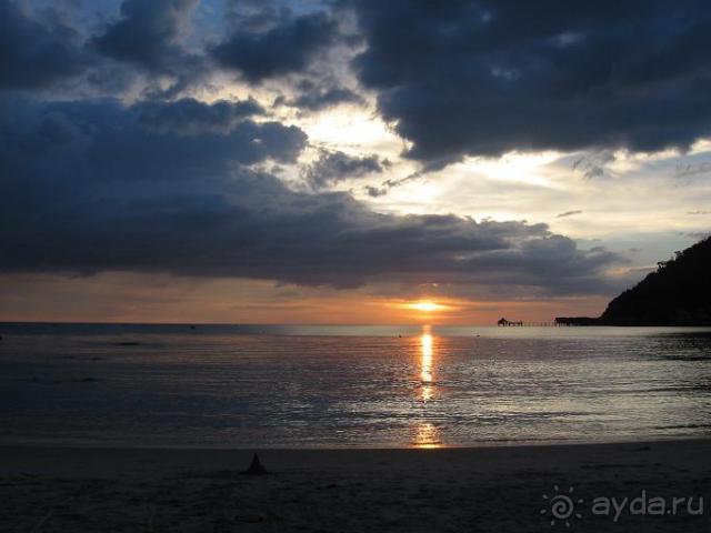 вид на закат с пляжа отеля