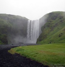 Skogafoss- "компактный и мощный", один из символов Исландии