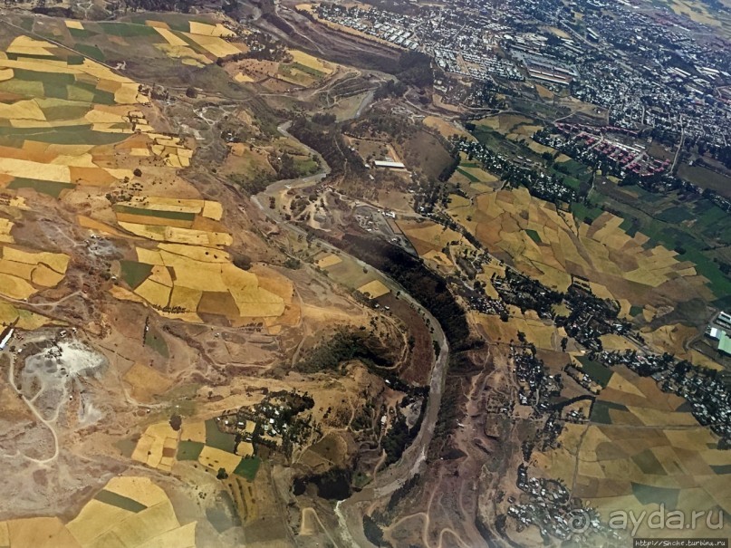 "Одеялом лоскутным на ней...городу 2000 лет, прожитых... "