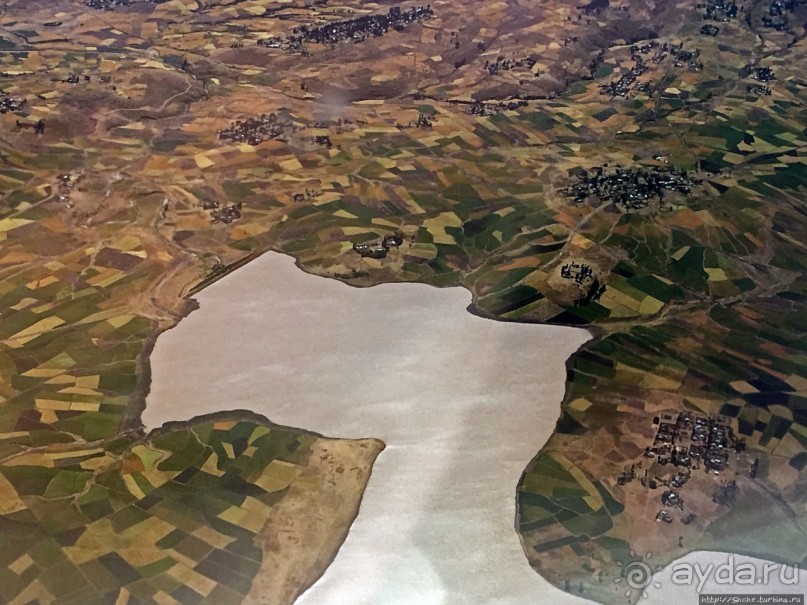 "Одеялом лоскутным на ней...городу 2000 лет, прожитых... "