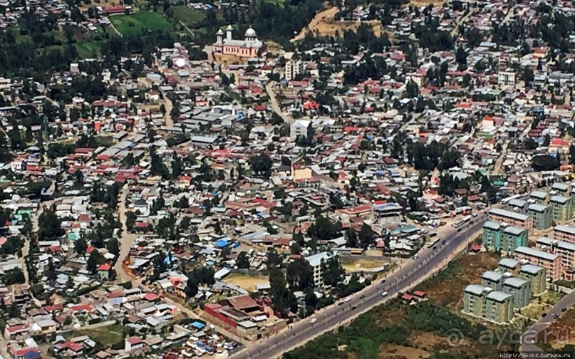 "Одеялом лоскутным на ней...городу 2000 лет, прожитых... "