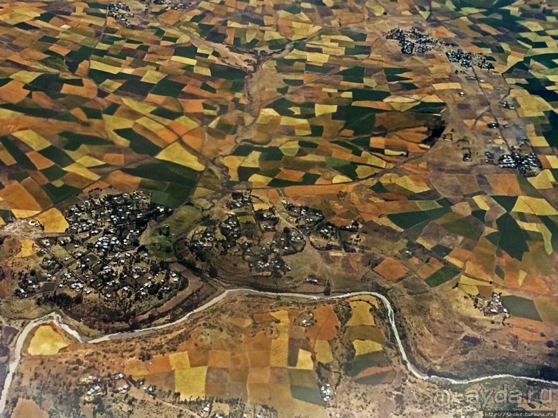 "Одеялом лоскутным на ней...городу 2000 лет, прожитых... "