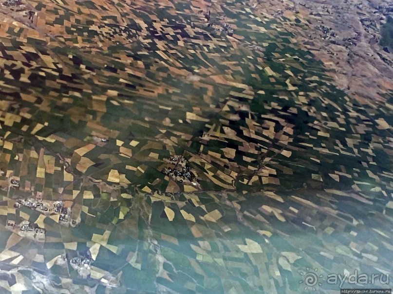 "Одеялом лоскутным на ней...городу 2000 лет, прожитых... "