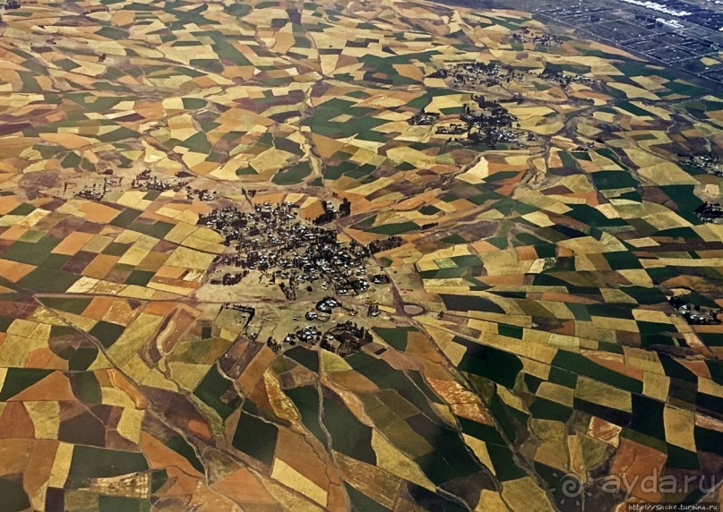 "Одеялом лоскутным на ней...городу 2000 лет, прожитых... "