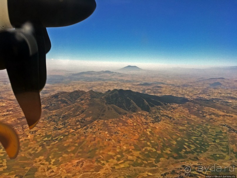"Одеялом лоскутным на ней...городу 2000 лет, прожитых... "