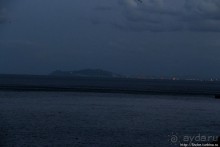 Заход солнца между Африкой и Испанией в Великобритании