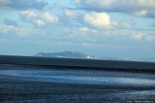 Заход солнца между Африкой и Испанией в Великобритании