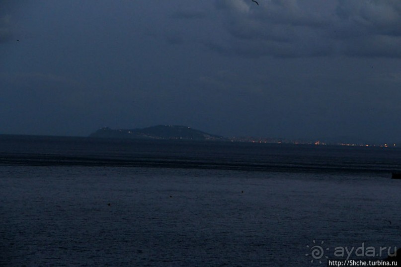 Заход солнца между Африкой и Испанией в Великобритании