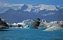 По лагуне причудливо-тающих льдов на плавающем авто-корабле