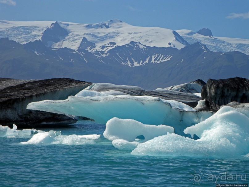 По лагуне причудливо-тающих льдов на плавающем авто-корабле