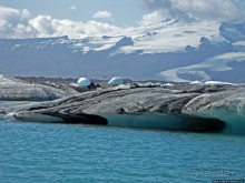 По лагуне причудливо-тающих льдов на плавающем авто-корабле