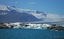 По лагуне причудливо-тающих льдов на плавающем авто-корабле