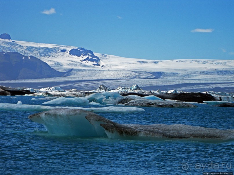 По лагуне причудливо-тающих льдов на плавающем авто-корабле