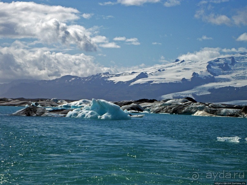 По лагуне причудливо-тающих льдов на плавающем авто-корабле