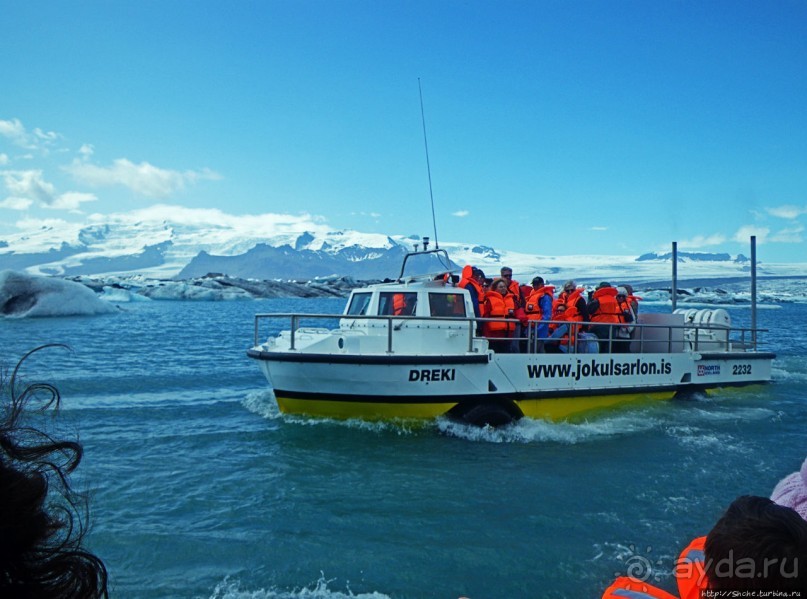По лагуне причудливо-тающих льдов на плавающем авто-корабле