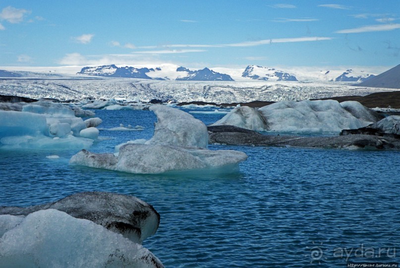 По лагуне причудливо-тающих льдов на плавающем авто-корабле