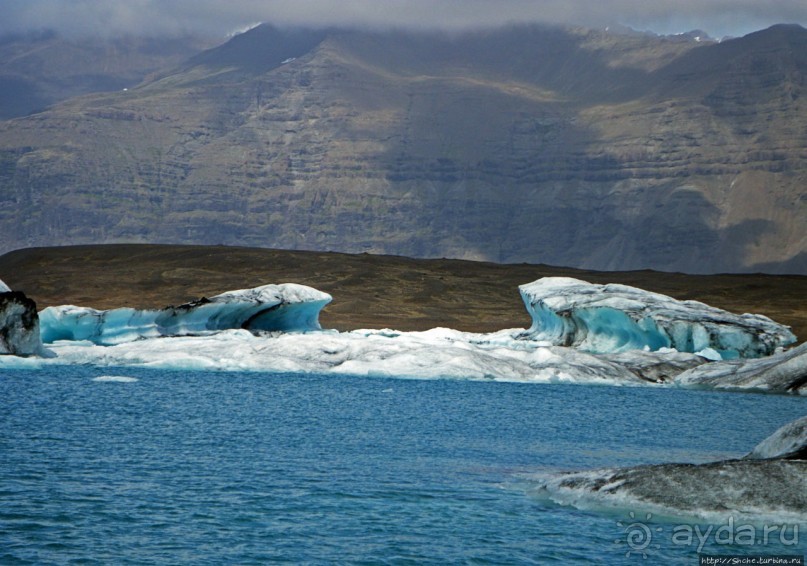 По лагуне причудливо-тающих льдов на плавающем авто-корабле