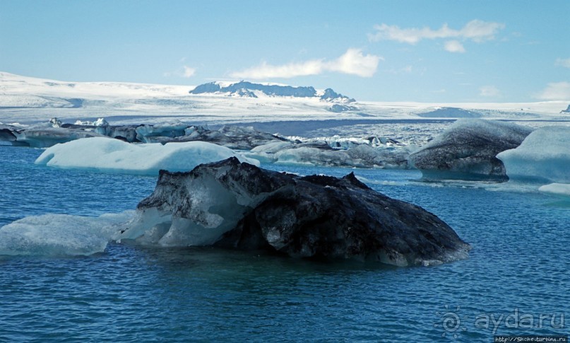 По лагуне причудливо-тающих льдов на плавающем авто-корабле