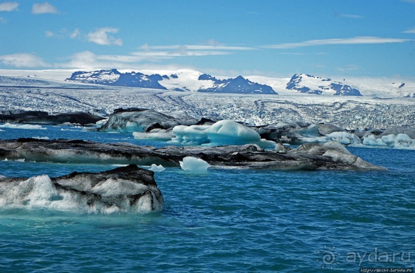 По лагуне причудливо-тающих льдов на плавающем авто-корабле