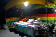 Ночной рынок морепродуктов на искусственном моле в Вонсане