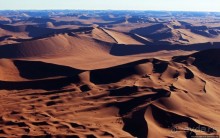 Под крылом самолета о чем-то поет песчаное море Намиб