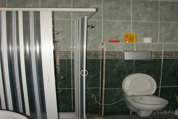 Санузел в отеле Le Palm