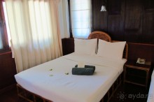 номер deluxe бунгало отеля Cocopalm Beach Resort 