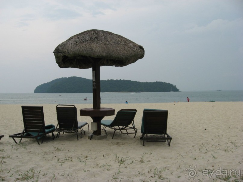 на пляже отеля Холидей вилла