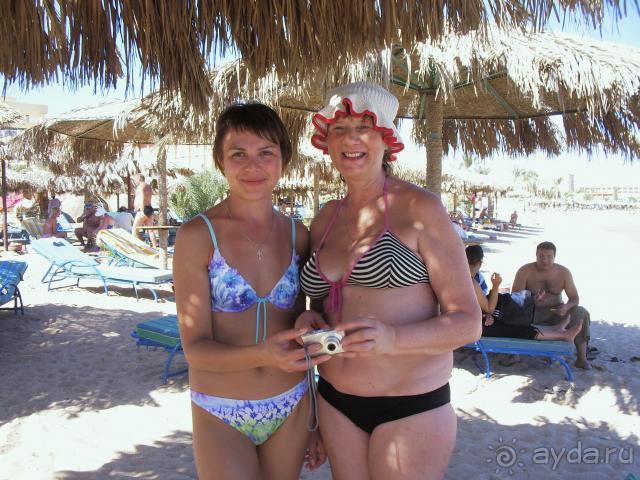 тётка на пляже