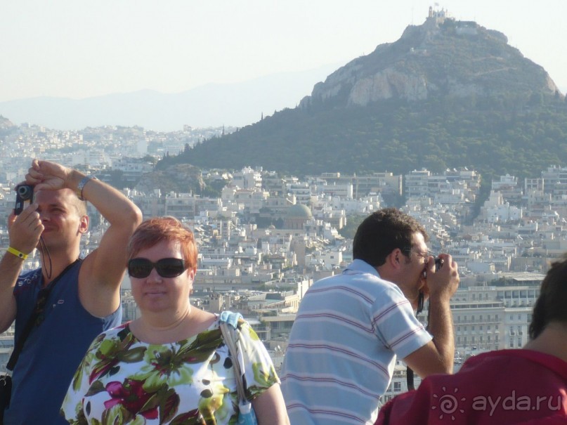 Все хотят запечатлеть бескрайний город 