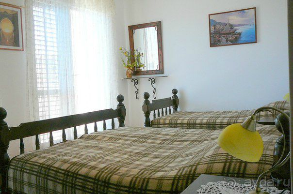 Спальня на 3 человека в одних из апартаментов.