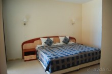 двуспальная кровать в Номере апартамент