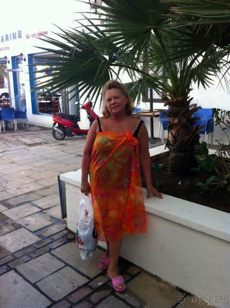 И даже немного загорела...