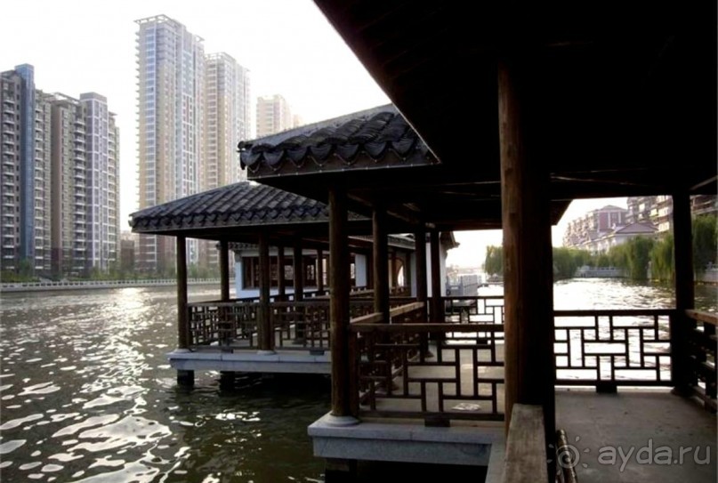 УСИ (WUXI) Китай