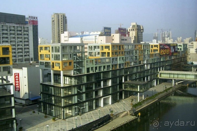 УСИ (WUXI) Китай