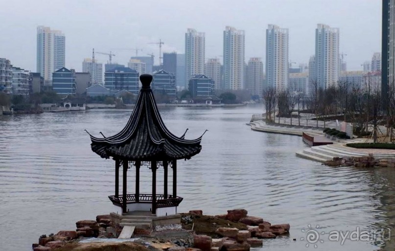 УСИ (WUXI) Китай