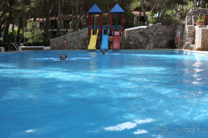 Семейный отель с отличным пляжем и кухней